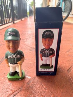 Multiple collectible bobble heads sold separately