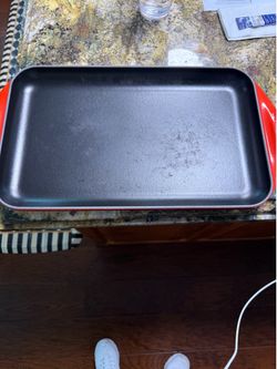 Le Creuset Cast Iron Griddle - Cerise Red. 15 1/4” x 8 2/3”.