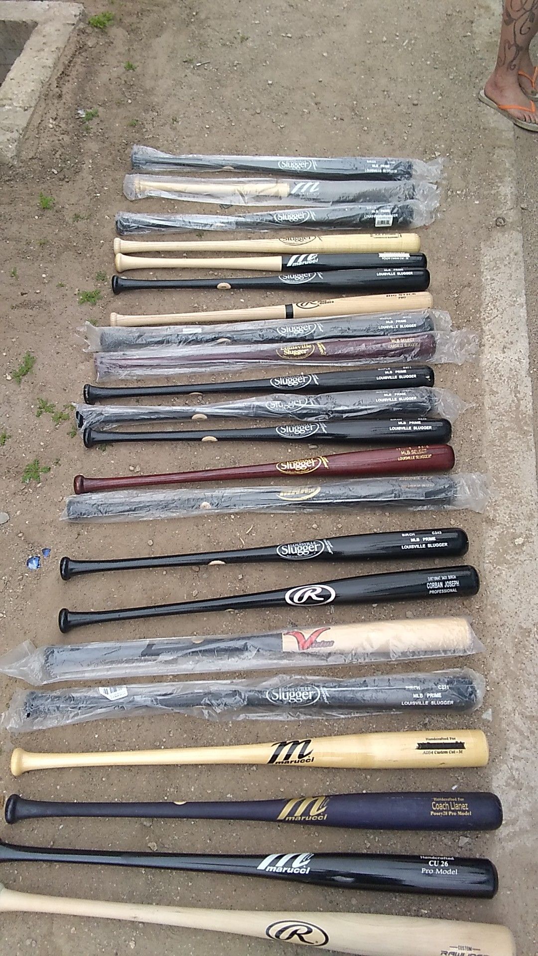 22 brand new baseball bats