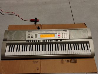 Casio WK-200 Keyboard 76 Keys with Power Cord