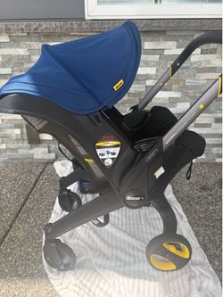 EXCELLENT CONDITION DOONA PLUS CAR SEAT!