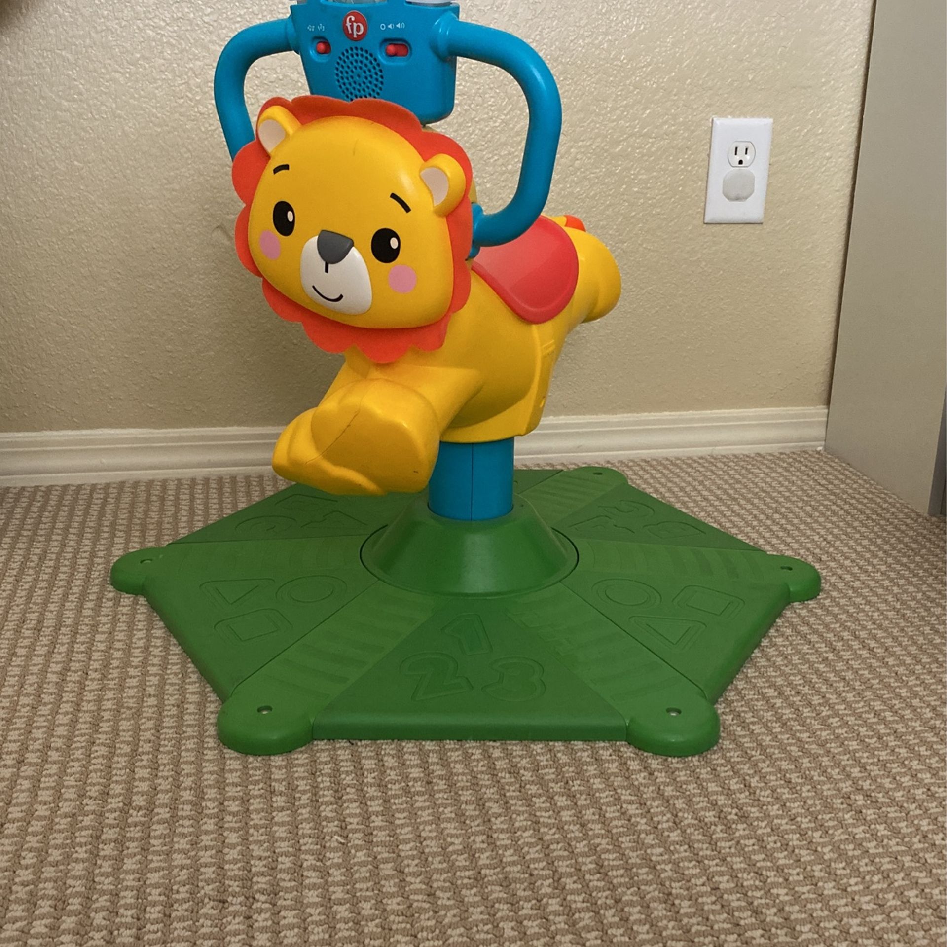 Fisher-Price Bounce & Spin Lion Stationary Ride-On Electronic Learning Toy for Toddlers