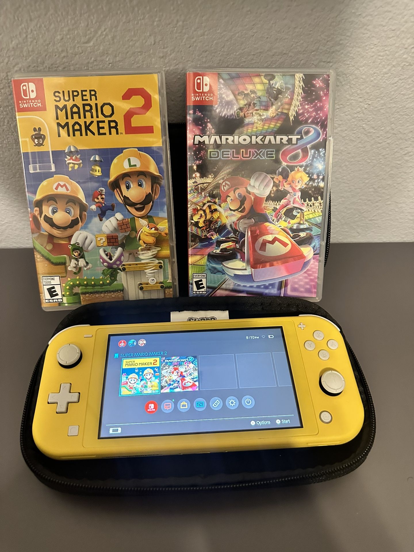 Yellow Switch light Mario Bundle With Mario Kart, Super Mario Maker And Mario Case