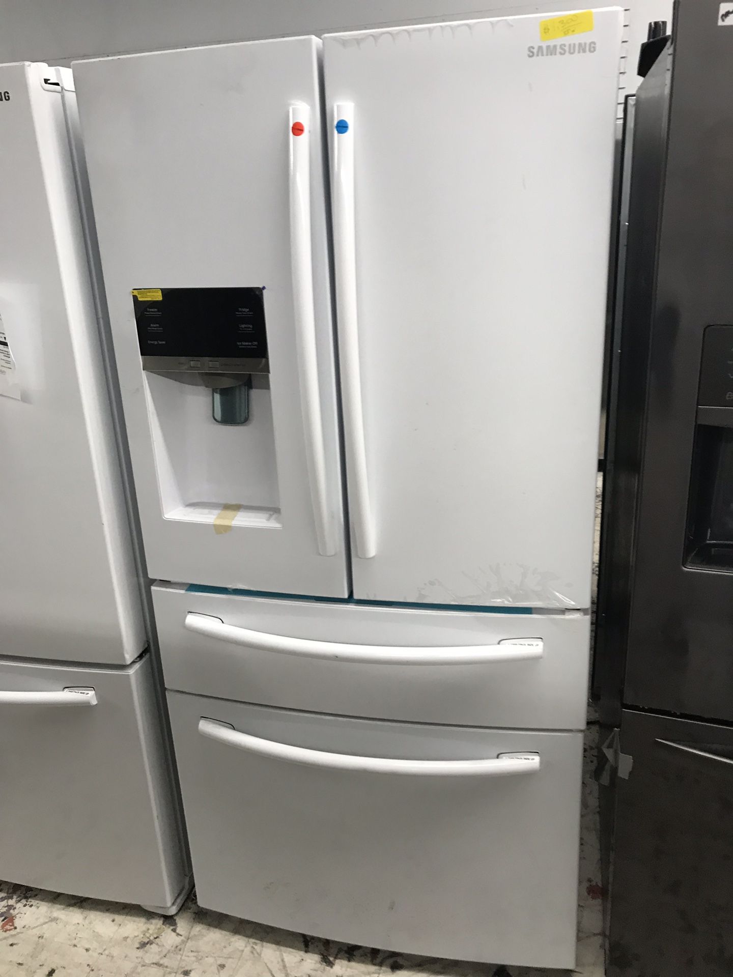 New Samsung white apartment size four door French door refrigerator