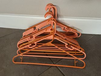 16 PLASTIC HANGERS FOR ONLY $8.00
