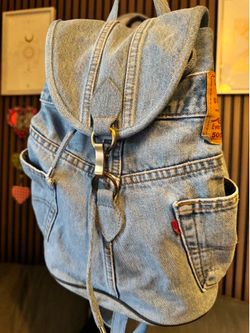 Small light denim backpack