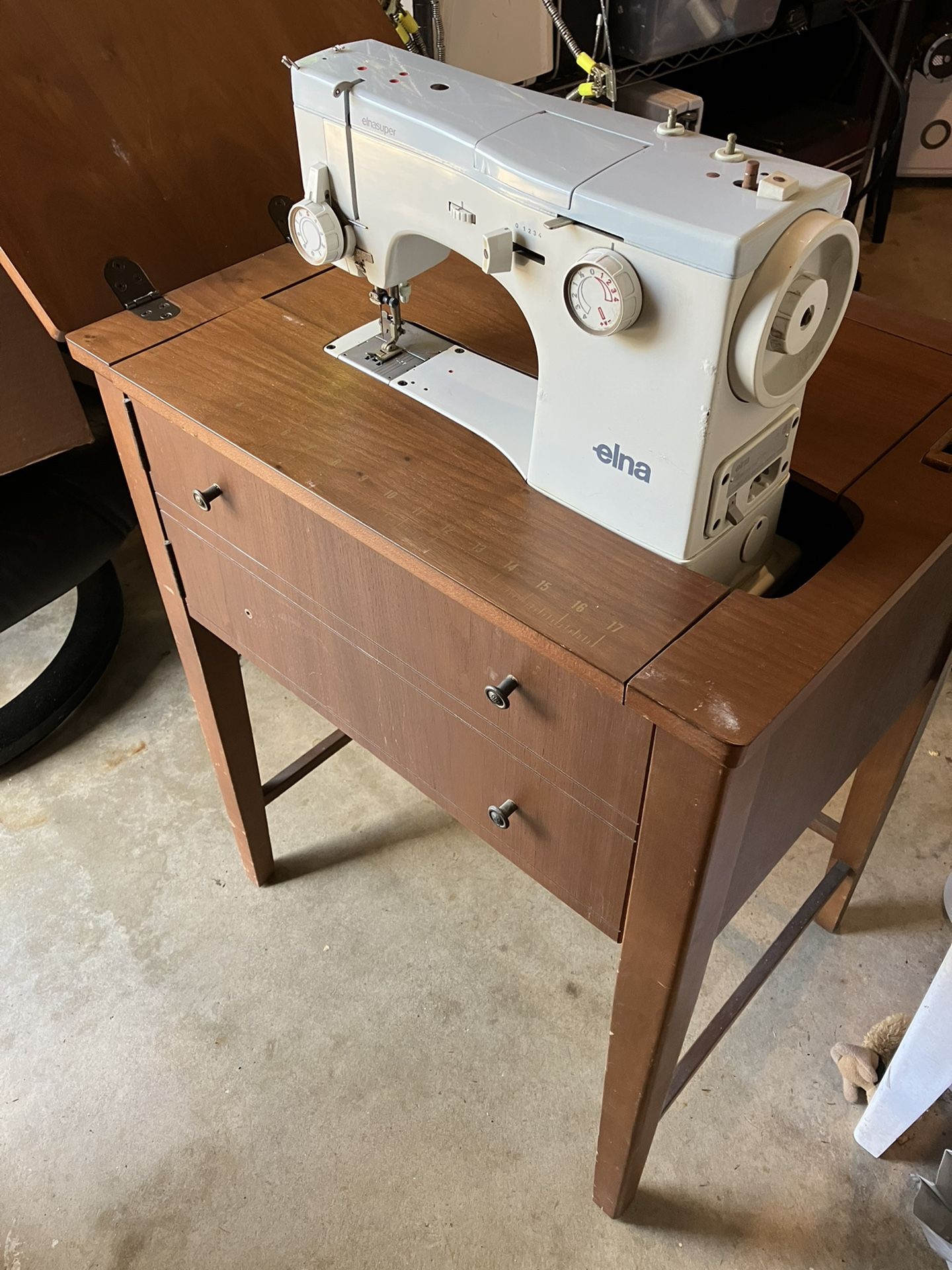 VINTAGE ELNA SUPER 62C HEAVY DUTY SEWING MACHINE SWITZERLAND w/ TABLE I do not have a foot pedal that fits so I'm unable to test but you're welcome t
