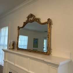 Mirror in antic gold