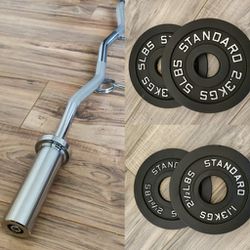 Brand New Curl Bar And 15lbs Worth Of Plates ALL NEW IN BOX FIRM PRICE 