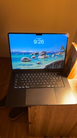 NEW 2026 MacBook Air M5 with a 15-inch screen, 16GB of RAM, and a 512GB SSD.  New under warranty and in box. $1249