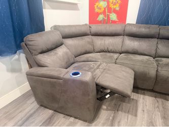 Sectional sofa 3 recliners in good condition dark gray