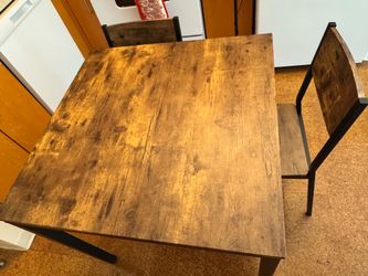Small dining table with two chairs