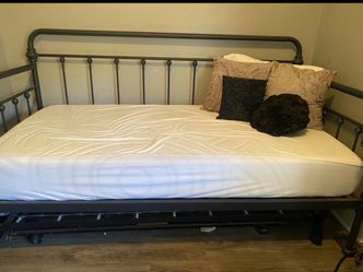 metal twin daybed with a pull-out trundle