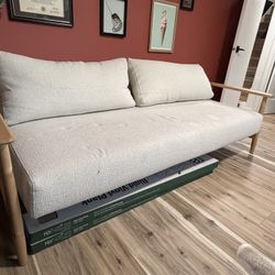 CB2 Una 84" ivory boucle sleeper sofa