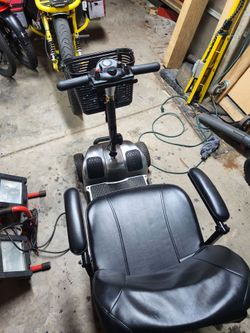Four wheel scooter