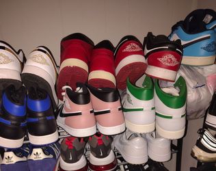 Lot of 55 size 14 mens shoes and slides. Most are new or wore one time except the last shoe rack