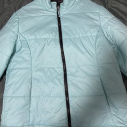 This is a Free Country Women's All Weather 3-in-1 Puffer Jacket 