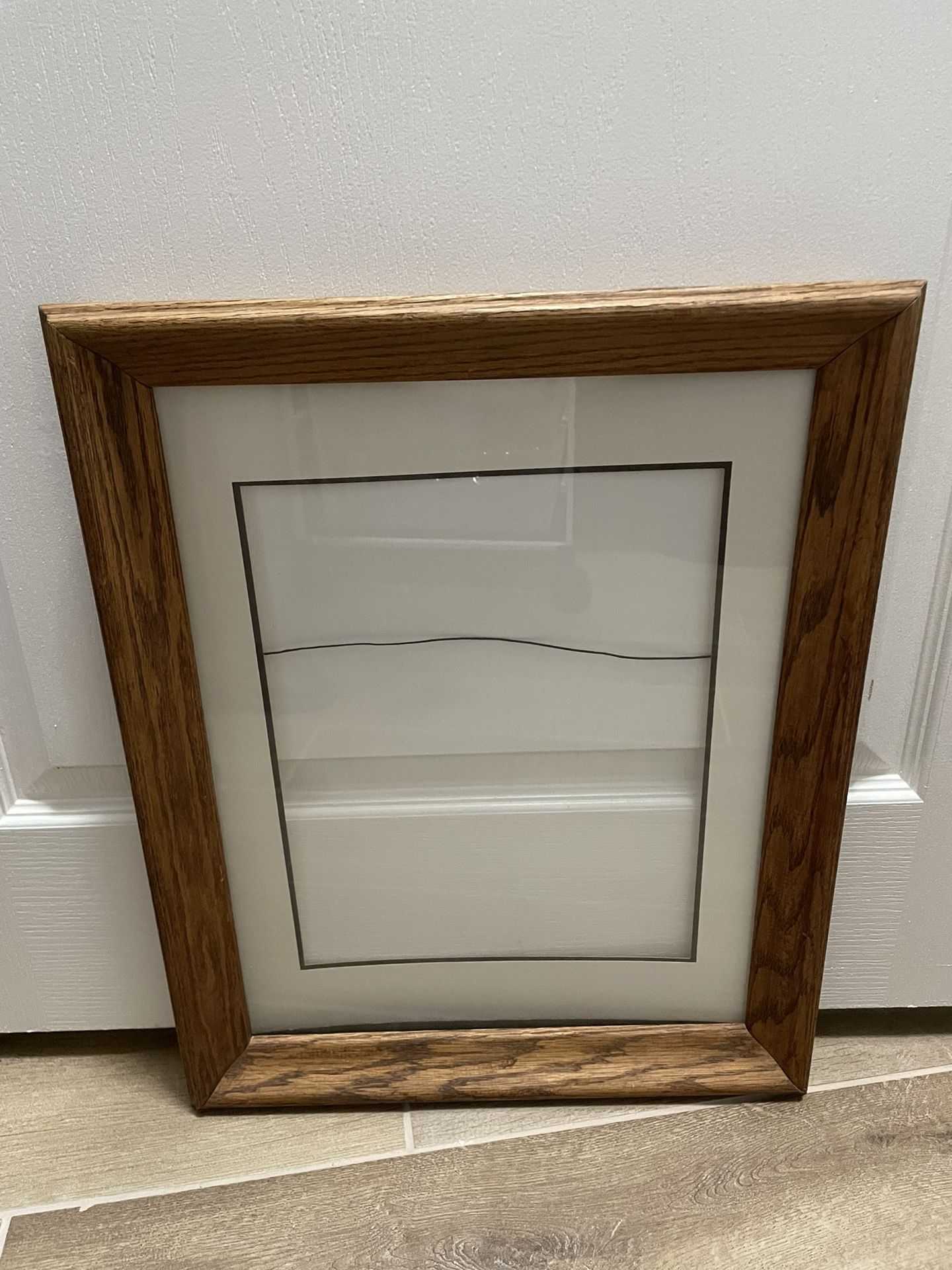 Oak Frame With Mat 21” x 17”. Mat Size 10 1/2” x 13 1/4”