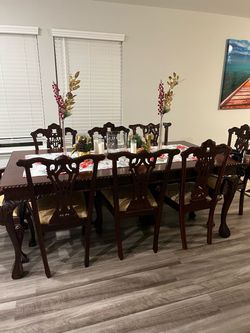 A piece, cherry wood, solid wood dinner table with cushion chairs