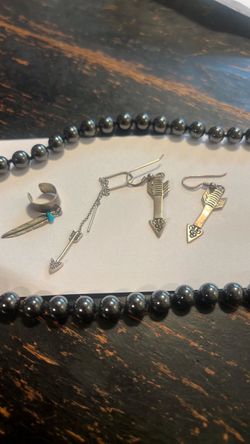 Sterling silver arrow and feather earrings