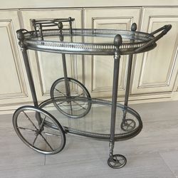 Bar Cart In Glass And Metal with 3 Rings For Wine Bottles. Has 4 Wheels And Is In Perfect Conditio