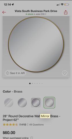 Round gold frame mirror