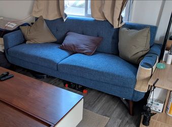 Blue Sofa (with cat damage)