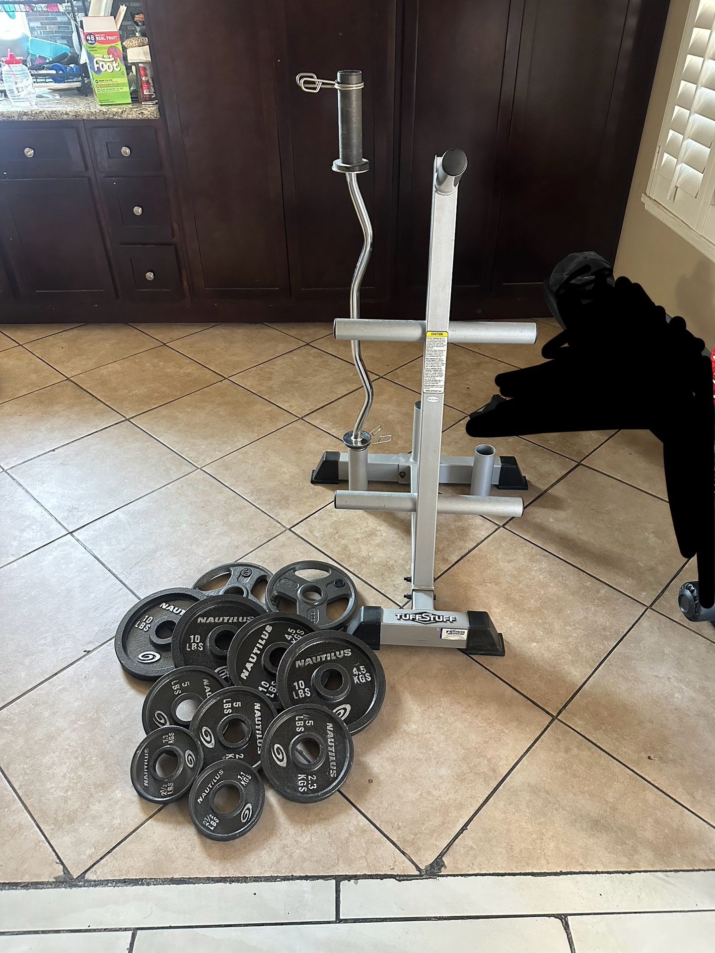 Heavy duty Tuff stuff weights tree plus curl bar and 85lbs of Olympic weights