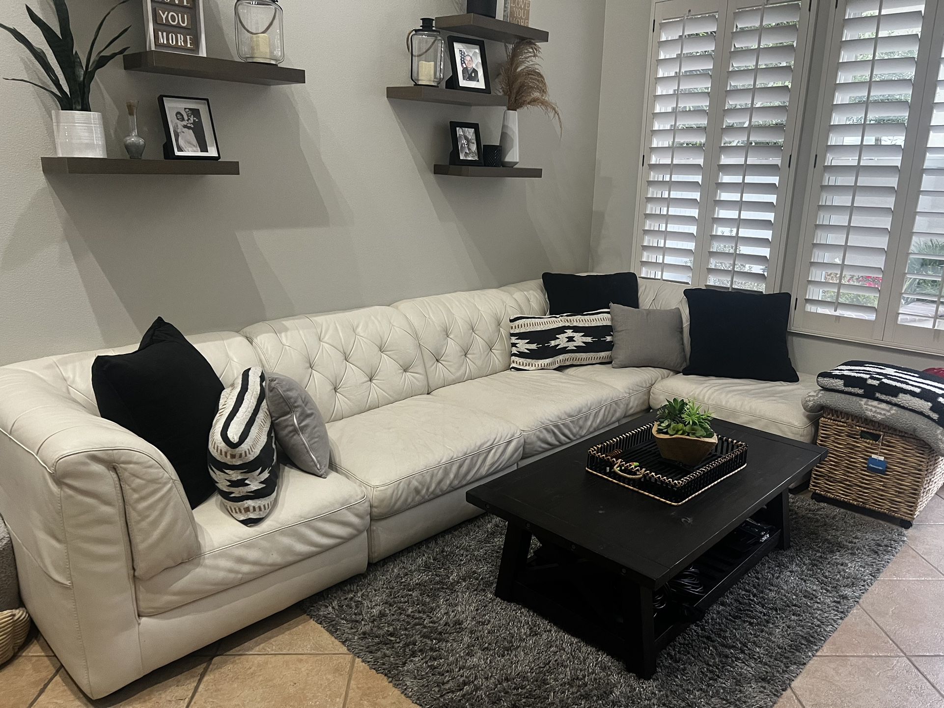 White Leather Section Couch And Ottoman