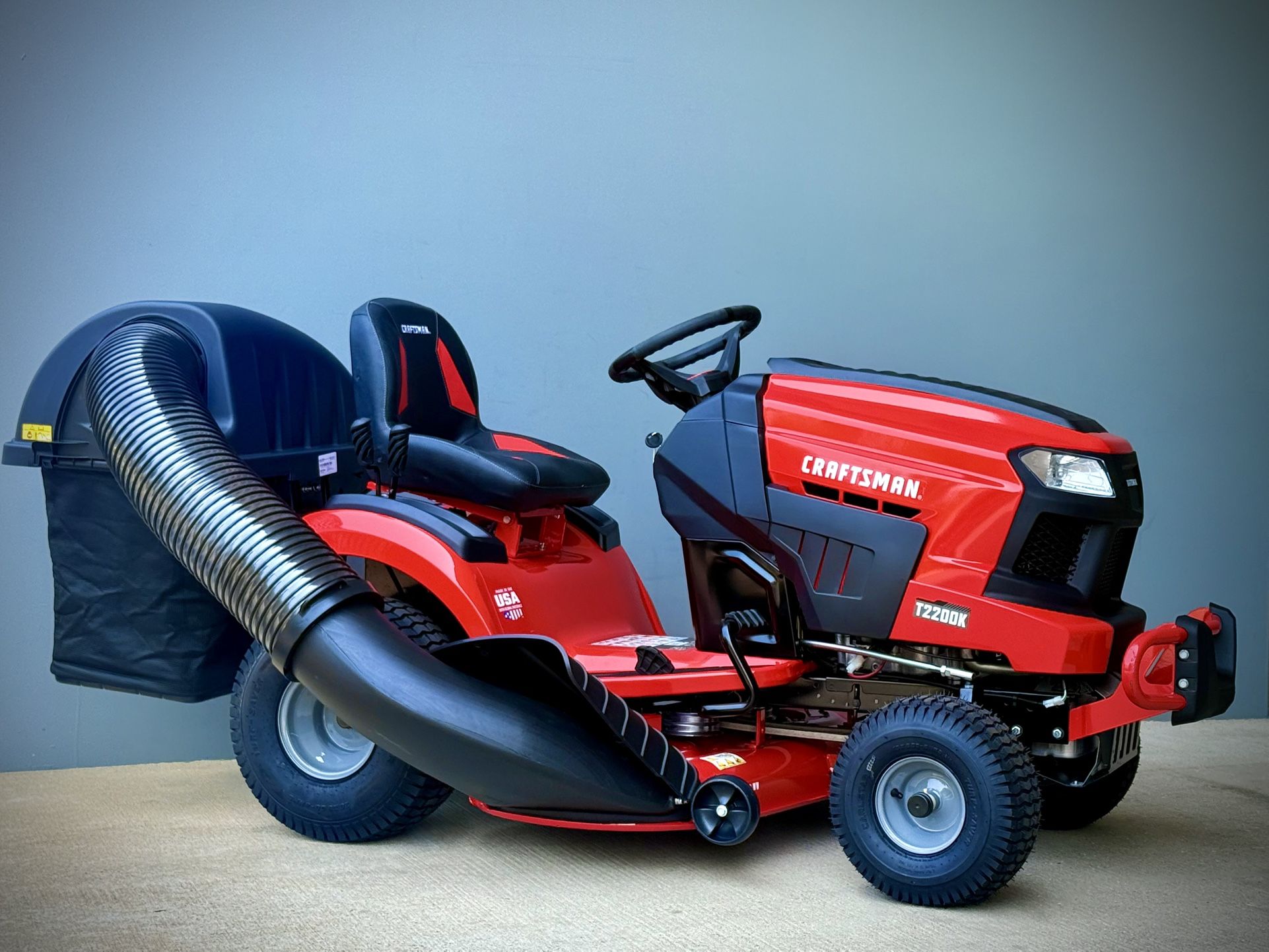 Brand new CRAFTSMAN T2200K Turn Tight 42-in 20 -HP Kohler V-twin Gas Riding lawn mower comes with extra Bagger on it. 