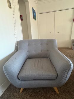 Grey upholstered chair