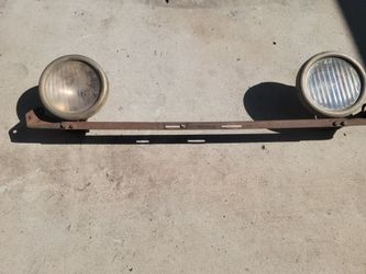 Model T headlight set on light bar Ford script with H on glass