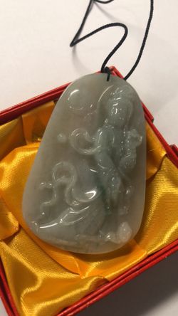 Natural certified A icy light green color God carved pendant