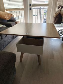 Coffee table extendable to large high table