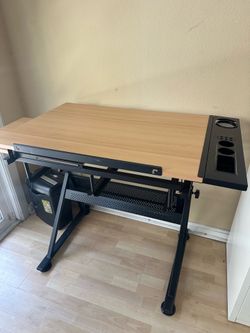 Adjustable artist drafting table and craft workstation