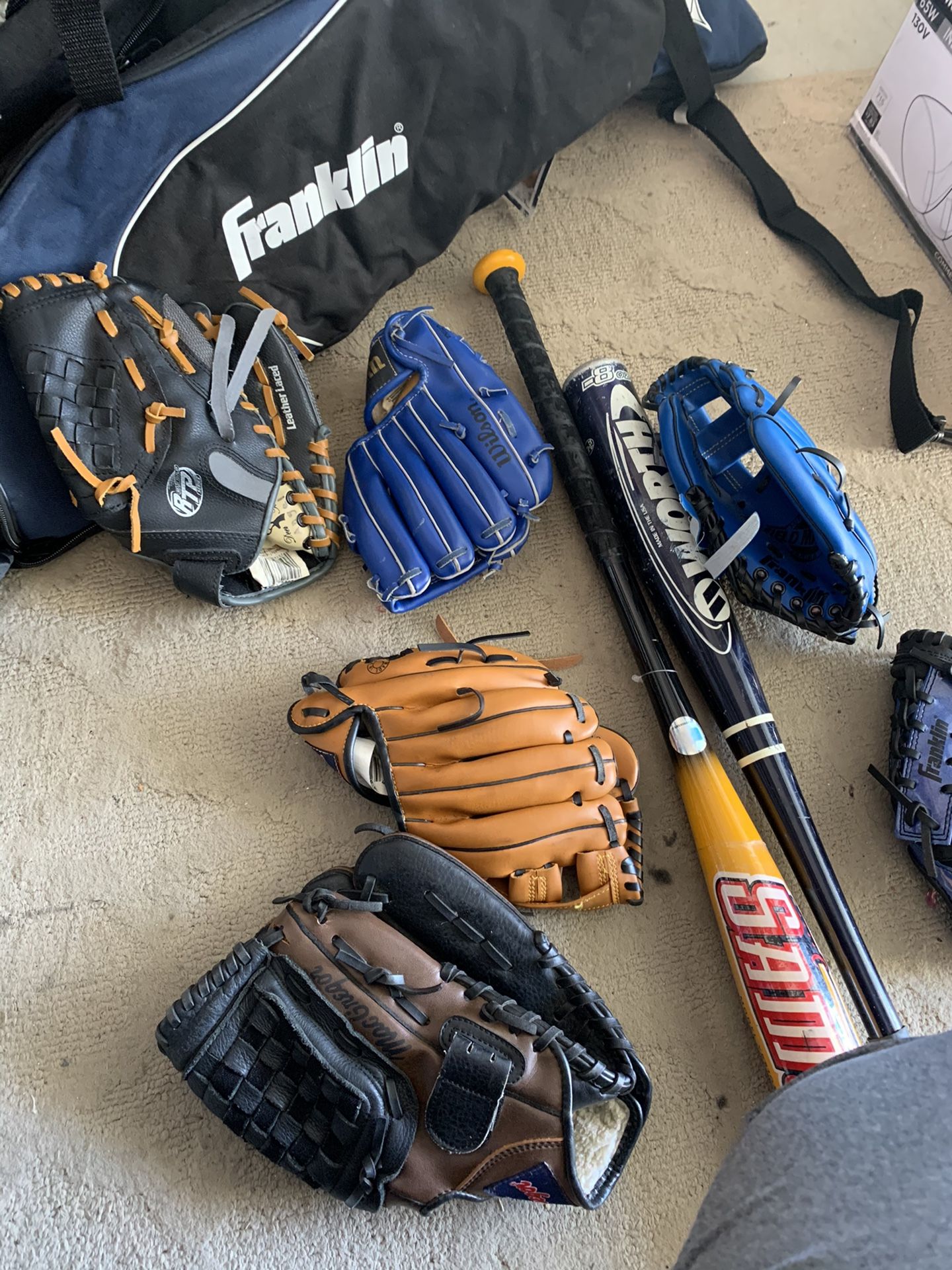 Baseball gloves and bats