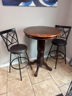 Bar top table and chairs