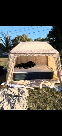 Inflatable camping tent with pump