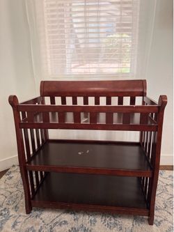 Delta Children Wooden Changing Table with Storage Shelves