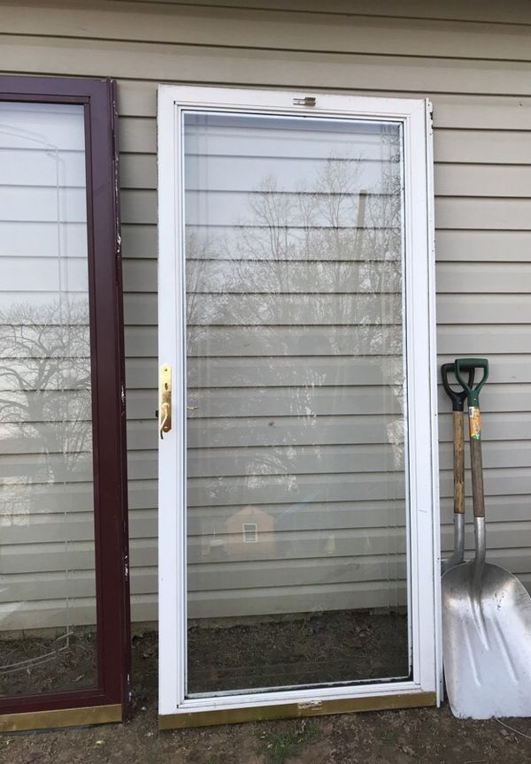 Storm door size is in images view them 79 tall 35 .5 wide for Sale in