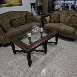 Sofa and  love seat and pillows, coffee table, 2 end tables and 2 lamps.$600.00