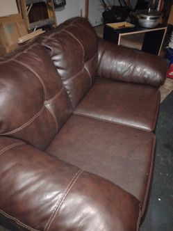 Two seater leather loveseat