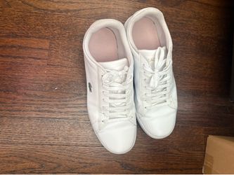 Classic white Lacoste sneakers
