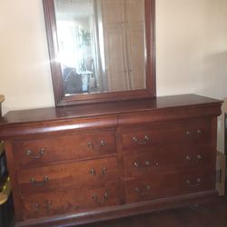 8 DRAW DRESSER WITH MIRROR $125 MOVING ASAP 