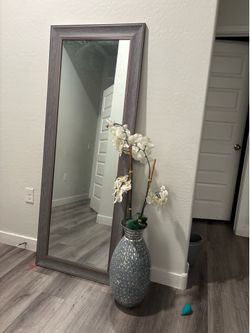Tall entry way body mirror and vase