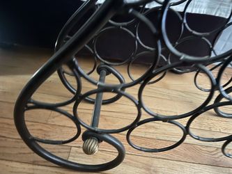 Wrought iron wine rack table