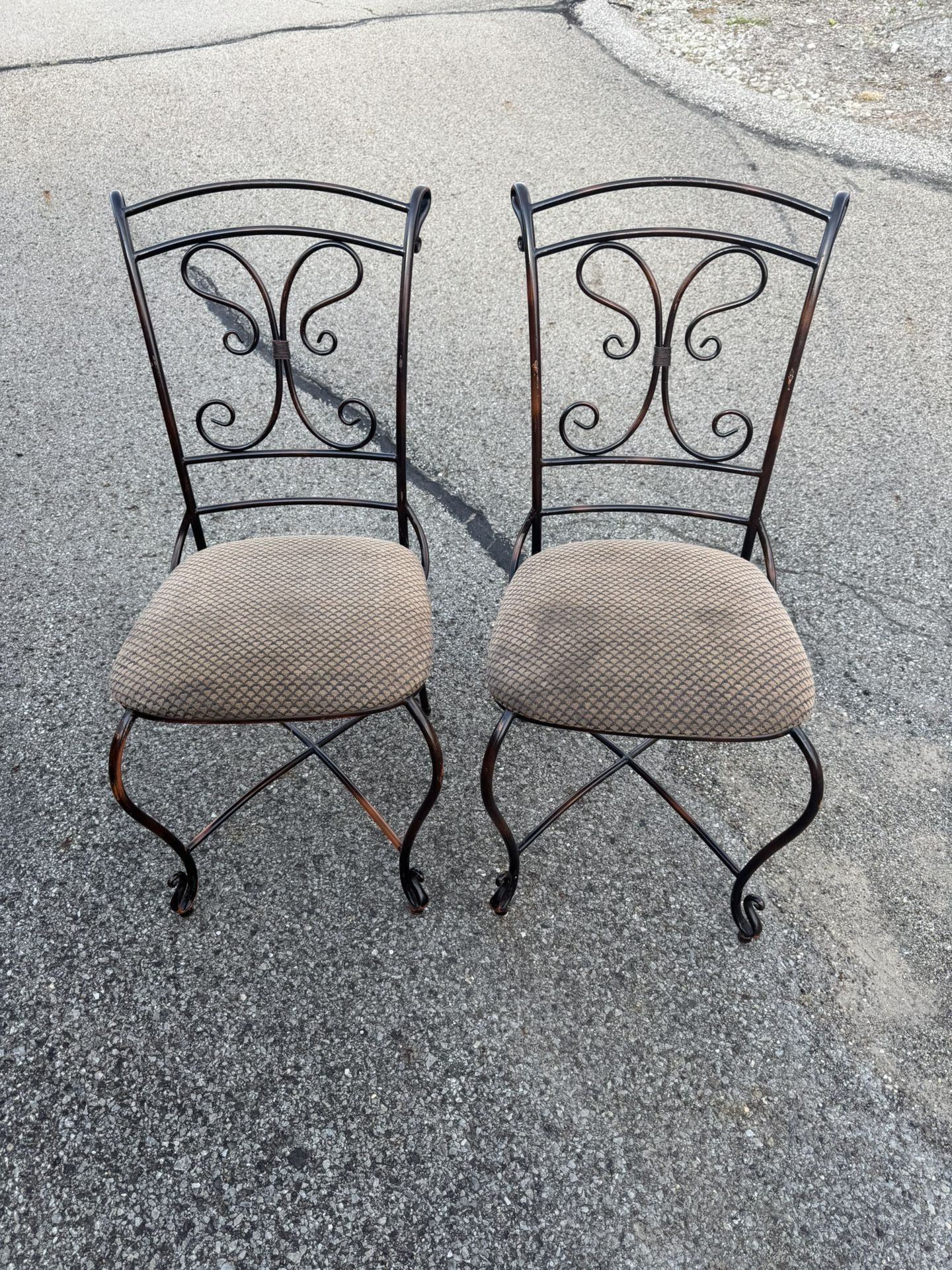 Set of wrought iron dining chair with an upholstered seat 17 3/4” wide 17 3/4” deep 18 1/2” floor to seat 37 1/2” tall in back Needs reupholstered