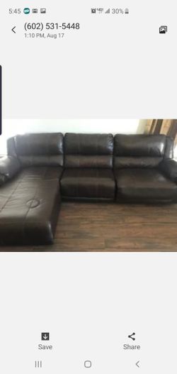 Ashley 3 piece sectional with Built-in Chase and recliner/ottoman