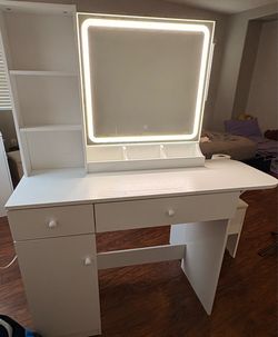 White vanity with LED light