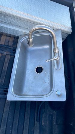 Kitchen sink with faucet